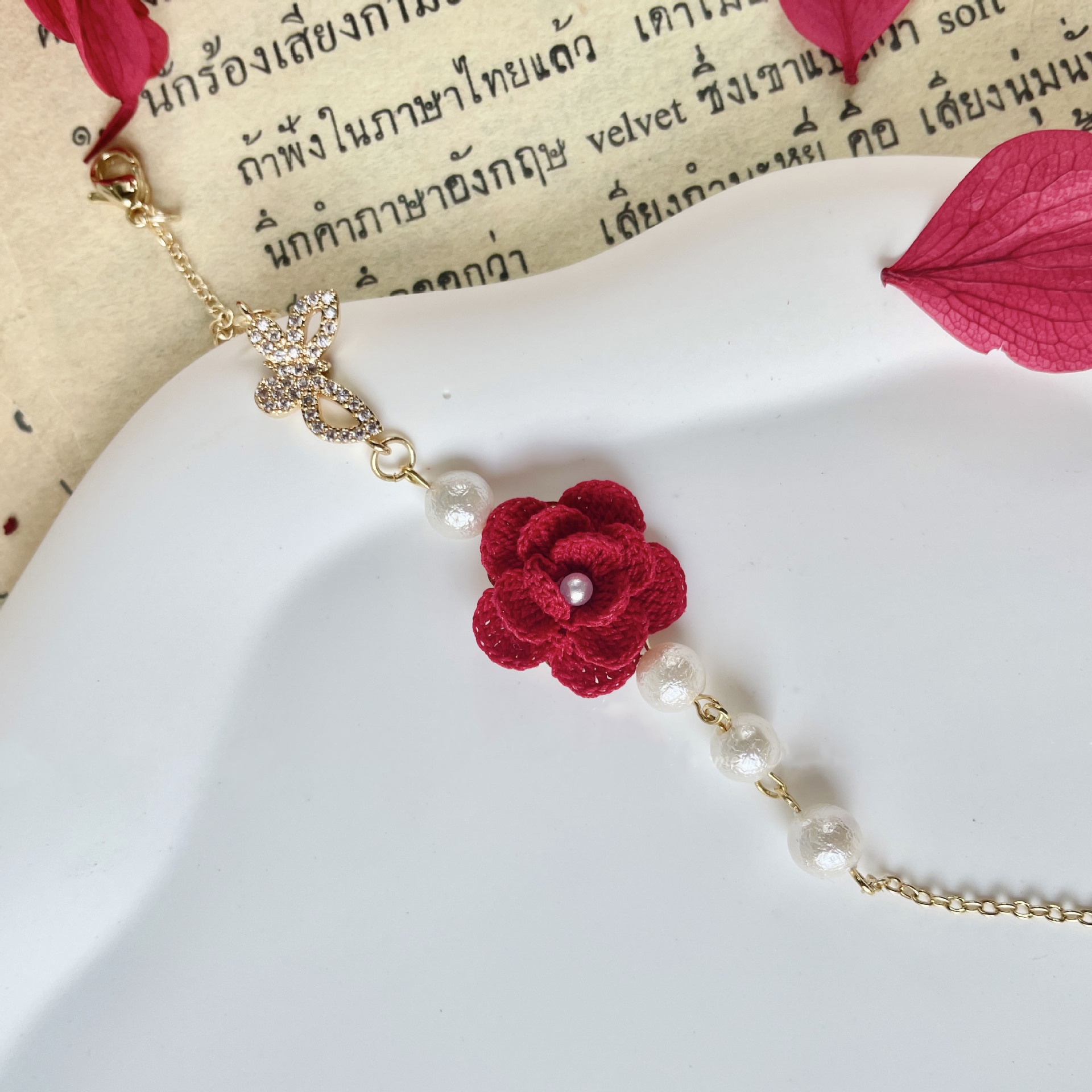 Handcrafted red floral micro crochet bracelet jewelry with pearls and butterfly charm