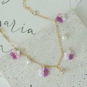 Wholesale mini handmade bracelets jewelry with purple and pink flowers, pearls, and gold chain