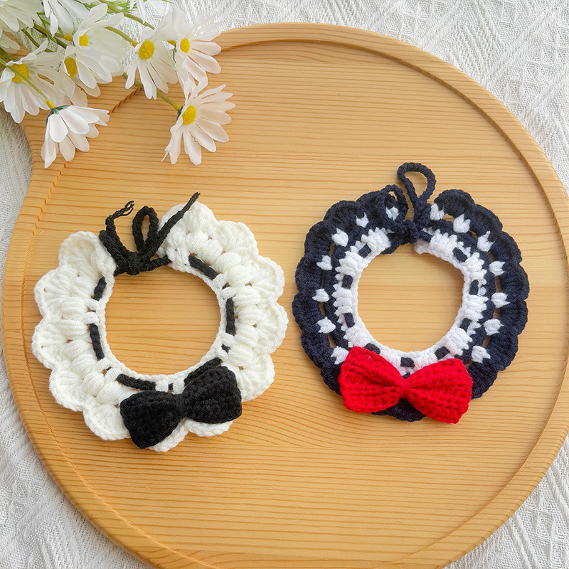 Wholesale crochet pet collars with bows in black and white, red and navy available as pet accessories.